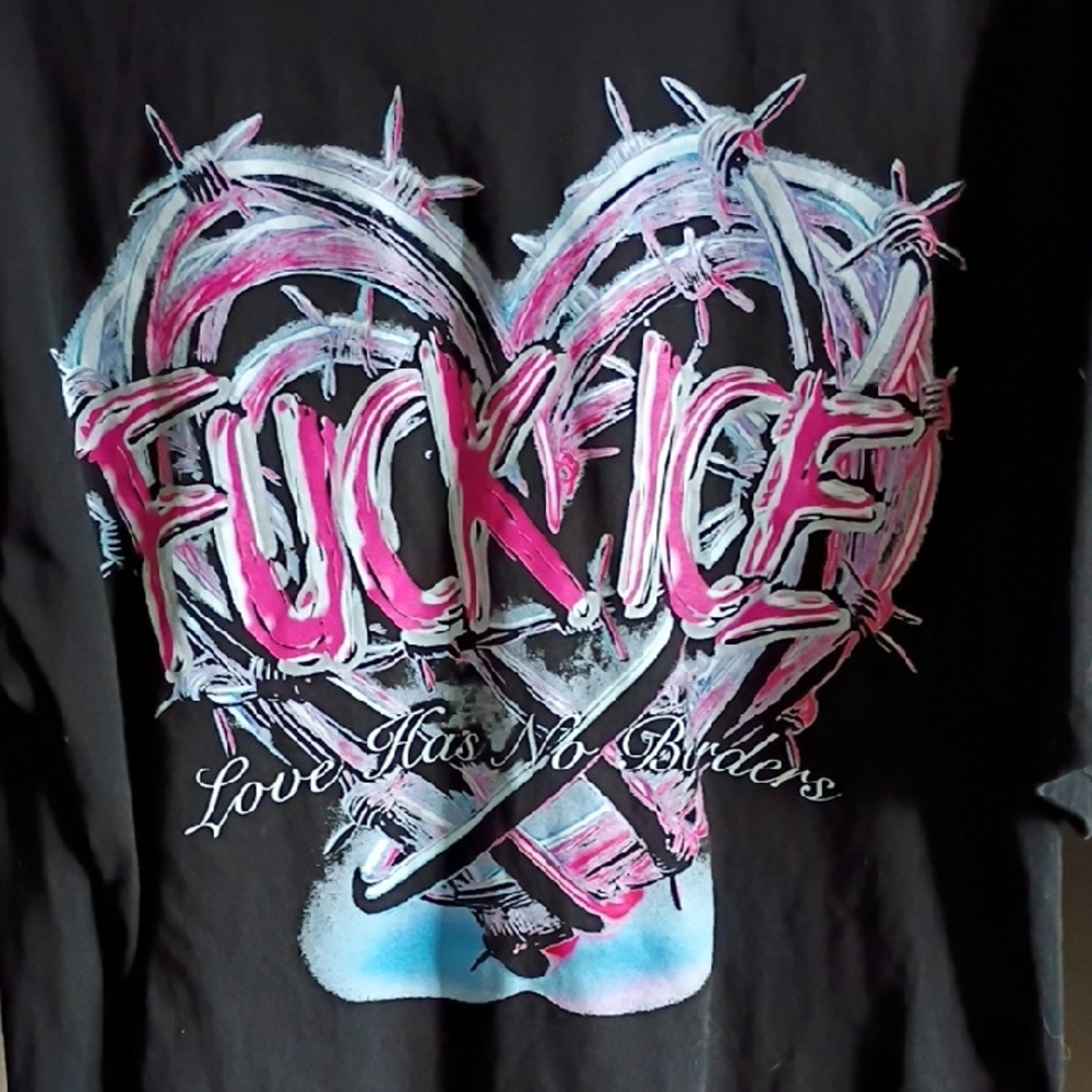 Black Graphic Tee with Heart Design